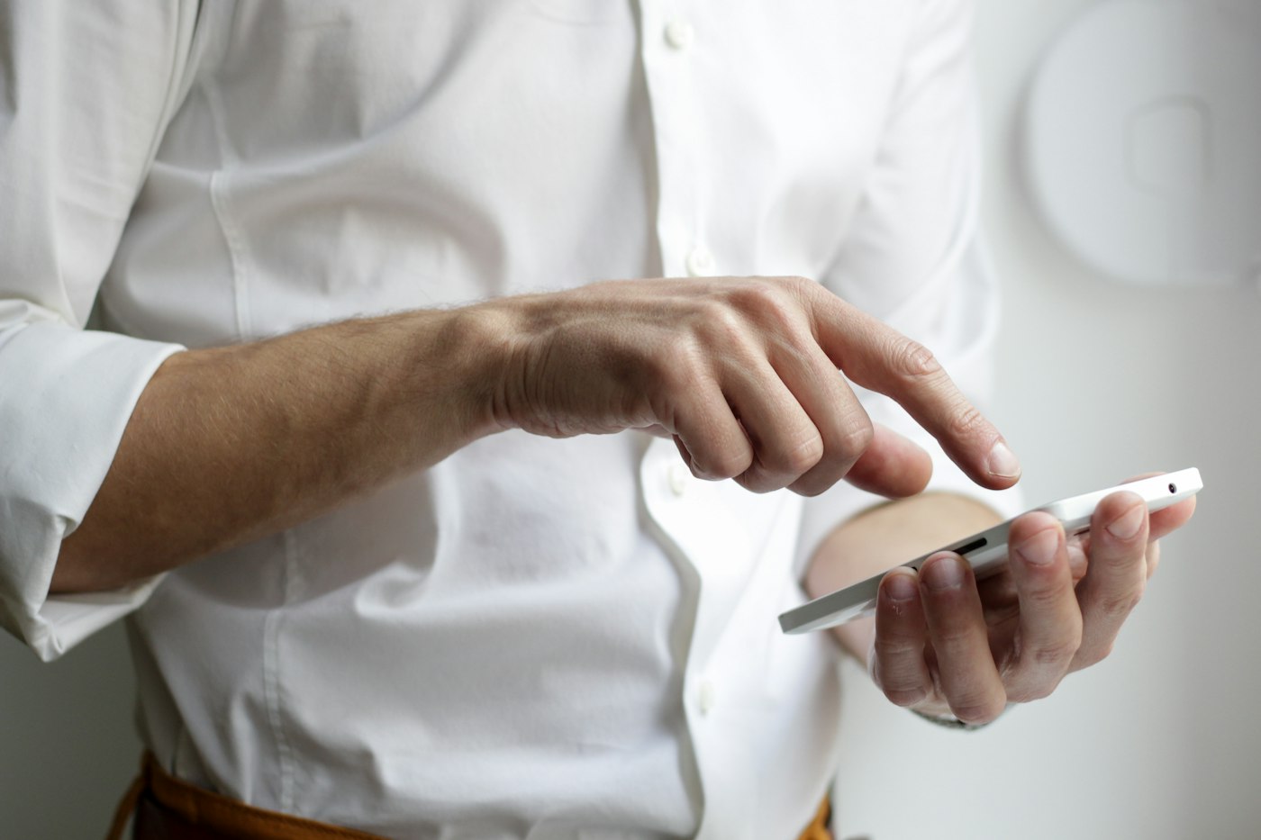 A person using the app on a phone
